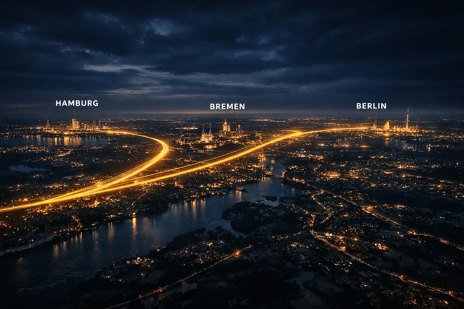 Nächtliches Luftbild einer Stadtlandschaft, verbunden durch leuchtende Verkehrswege